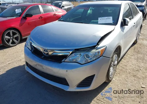 2014 Toyota Camry Le z USA, uszkodzony, nr VIN 4T4BF1FK8ER420967